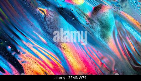 Abstract liquid surface displaying a vivid spectrum of glowing neon colors, blue, pink, and orange, with trapped air bubbles Stock Photo