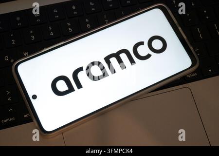 Mexico city, mexico, 06 20 2026, smartphone showing aramco logo resting on a computer keyboard Stock Photo