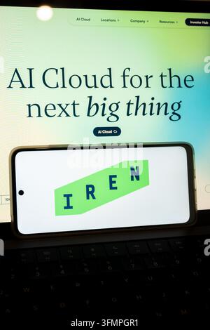 Mexico city, mexico, 07 01 2026, smartphone displaying iren logo on keyboard, ai cloud text appearing in background Stock Photo