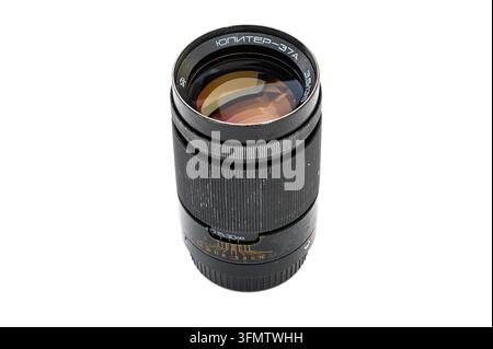 Iserlohn, Germany - September 20, 2026: Vintage Soviet Jupiter-37A camera lens isolated against a plain white background. Stock Photo