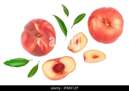 Ripe chinese flat peach fruit and half with leaf isolated on white background. Top view. Flat lay Stock Photo