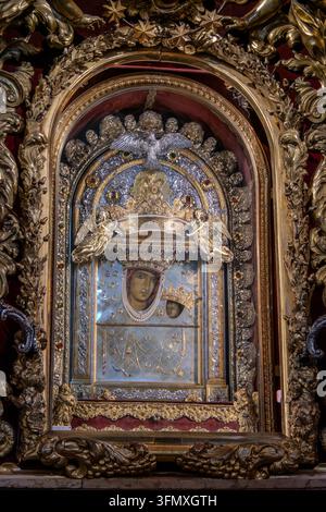 Bologna, Italy, August 4, 2026. A close up vertical shot displays the sacred and historic icon of the Madonna di San Luca, housed inside the Basilica Stock Photo