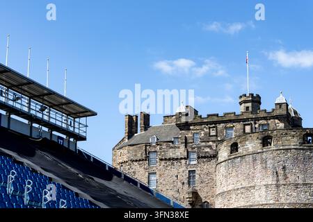 Edinburgh, Scotland, UK - July 20, 2026: Edinburgh Castle rises above the blue seating and modern grandstands of the Royal Edinburgh Military Tattoo Stock Photo