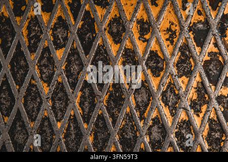 Worn Yellow Diamond Plate Metal Texture with Grid Pattern Stock Photo