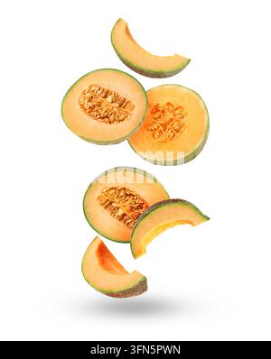 Pieces of cantaloupe melon falling on white background Stock Photo
