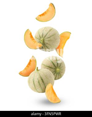 Fresh cantaloupe melons falling on white background. Whole and sliced Stock Photo
