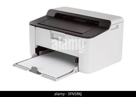 Small compact white laser printer with blank sheets of paper, isolated on a white background. Stock Photo