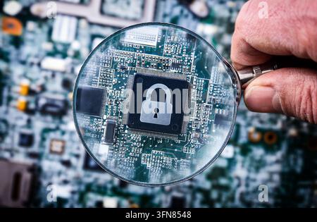 Close-up of a computer chip with a lock symbol viewed through a magnifying glass, representing cybersecurity, data protection, and digital privacy. Stock Photo