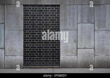 Contrasting Brick and Stone Wall Stock Photo