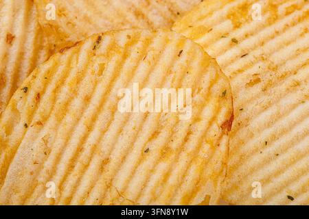 Lots of potato chips, texture close up Stock Photo