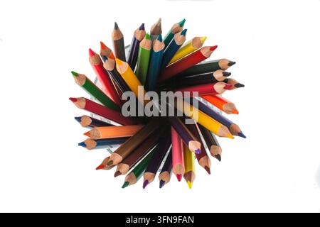 Top view of colorful colored pencils arranged in a pencil holder, isolated on a clean white background, suitable for art, drawing, creativity, educati Stock Photo