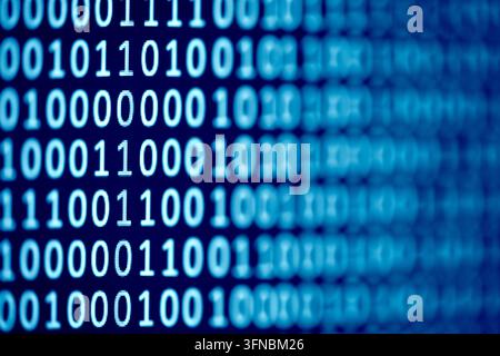 Binary code background on computer screen Stock Photo