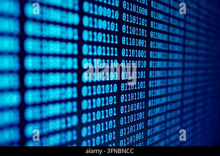 Binary code background on computer screen Stock Photo
