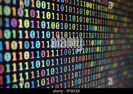 Colorful binary code background on computer screen Stock Photo