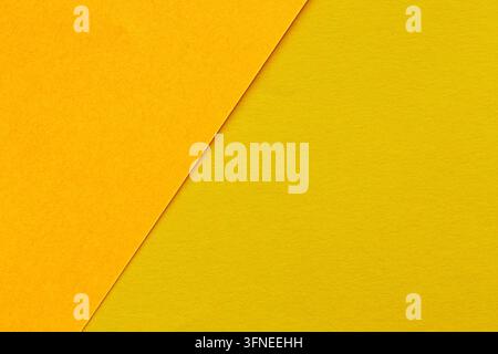 Orange and yellow paper texture background with overlapping sheets and a diagonal edge Stock Photo