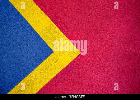 London, UK, October 03 2026, Abstract Geometric Car Park Floor Markings With Bold Blue, Yellow And Pink Paint On Asphalt Stock Photo