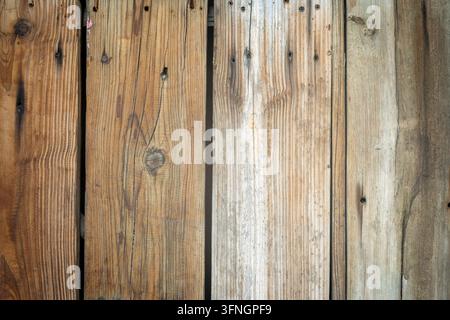 Old Weathered Wooden Fence Planks with Knots and Nails – Rustic Natural Wood Texture Background Stock Photo