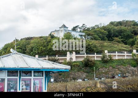 Great Orme Cable Car ascending the Great Orme above Llandudno, viewed from Llandudno Pier, North Wales Stock Photo