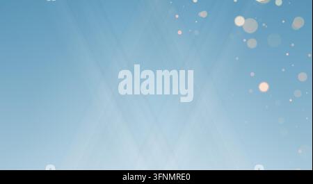 Minimalist winter scene featuring soft snowflakes against a bright blue sky,. Stock Photo