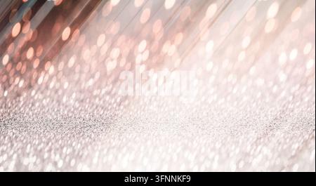 Minimalist glitter texture with blurred light bokeh. Stock Photo