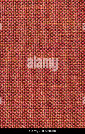Detailed macro shot of a tight patterned textile featuring an alternating grid weave of bright red and olive green yarn threads with crisp high-contra Stock Photo