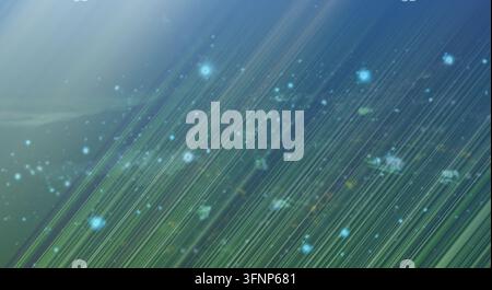 Abstract background featuring diagonal light motion and glowing particles. Stock Photo