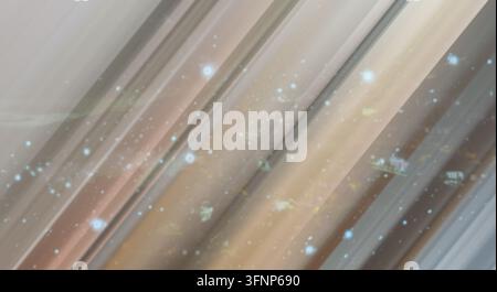 Abstract background featuring diagonal light motion and soft particles. Stock Photo