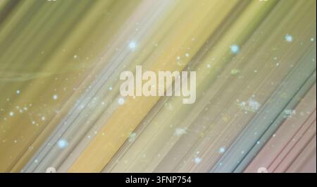Abstract background featuring diagonal light rays and glowing particles. Stock Photo