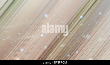 Abstract background featuring diagonal light lines and glowing particles. Stock Photo