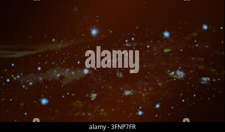 Dark abstract background featuring glowing bokeh particles and copy space. Stock Photo