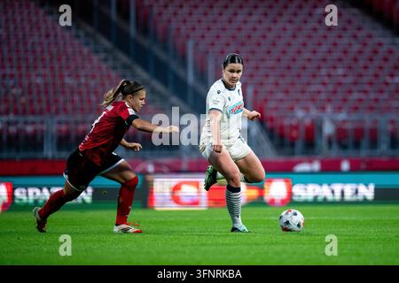 Svenja Fölmli (Hoffenheim, #19) on the ball in front of Medina Desic ...