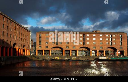 The historic Royal Albert Dock under a dramatic stormy sky, Liverpool, England, UK. Stock Photo