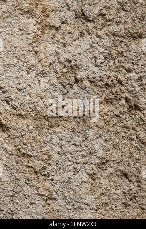 Rough Beige Stucco Wall Texture Background with Natural Weathered Plaster Surface. Stock Photo