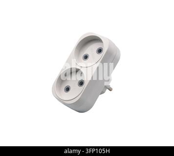 A white plastic electric splitter adapter with two sockets and a European plug, shown against a white background. Stock Photo