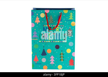 Christmas paper gift bag isolated on a clean white background, suitable for holiday shopping, gift giving, Christmas presents, packaging, festive cele Stock Photo