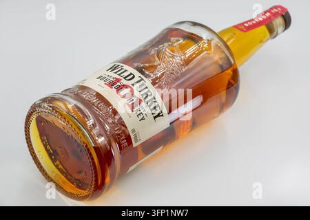 Kyiv, Ukraine - July 26, 2025: Wild Turkey 101 Kentucky straight bourbon whiskey bottle with embossed turkey design and branded label, closeup on whit Stock Photo