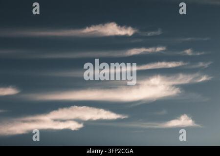 View of elongated clouds drifting across the sky above Vormsi, Laane County, Estonia. Stock Photo