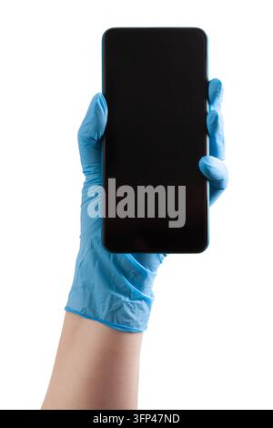 Hand wearing blue protective nitrile glove holding smartphone with blank screen isolated on white. Mockup for medical app, cleaning service, disinfect Stock Photo