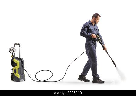 Worker operating a high pressure washer isolated on a white background Stock Photo