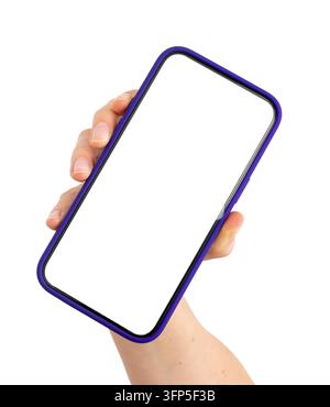 Hand holding blank smartphone mockup, purple frame isolated on white background. Fingers grip tilted phone display, empty screen template for app or w Stock Photo