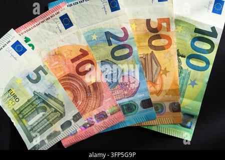 Euro banknotes on, 5 euro, 10 euro, 20 euro, 50 euro and 100 euro banknotes - close-up Stock Photo