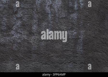 Dark grunge wall texture. Dark rough surface stucco background. Photo background texture. Stock Photo
