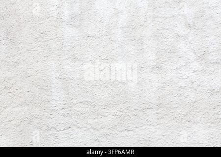 White grunge wall texture. White rough surface stucco background. Photo background texture. Stock Photo