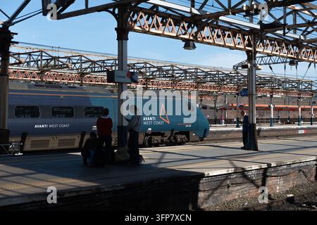 Avanti West Coast trainset 390126 forms the 1M14 1335 Glasgow Central to London Euston Service passing through Crewe. Stock Photo