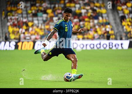 Richard Rios #6 of Colombia in action against Jesus Pretell #6 of Peru ...