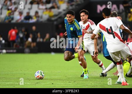 Richard Rios #6 of Colombia in action against Jesus Pretell #6 of Peru ...