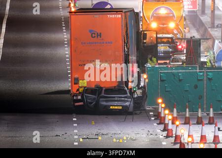 M5 Motorway, Quinton, Birmingham 7th October 2026 - West Midlands Police and Fire Service on scene of a fatal collision on the Northbound M5 Motorway between Junctions 4 and 3 close to the Quinton area of Birmingham on Tuesday (6th) evening. A 39-year-old man, who was driving a silver Peugeot died of fatal injuries at the scene after his vehicle ploughed into the rear of a lorry and caught fire. The car was  pictured on the back of a recovery vehicle with the front completely crumpled. The side of the trailer was also pictured with a large section melted by the fire that ensued after the colli Stock Photo