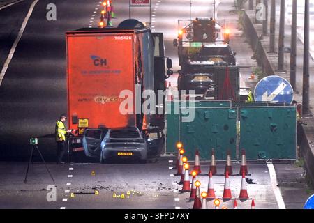 M5 Motorway, Quinton, Birmingham 7th October 2026 - West Midlands Police and Fire Service on scene of a fatal collision on the Northbound M5 Motorway between Junctions 4 and 3 close to the Quinton area of Birmingham on Tuesday (6th) evening. A 39-year-old man, who was driving a silver Peugeot died of fatal injuries at the scene after his vehicle ploughed into the rear of a lorry and caught fire. The car was  pictured on the back of a recovery vehicle with the front completely crumpled. The side of the trailer was also pictured with a large section melted by the fire that ensued after the colli Stock Photo