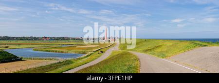 Dike with the Huisduinerpolder and the Lange Jaap Lighthouse, Huisduinen, Den Helder, North Holland, Netherlands Stock Photo