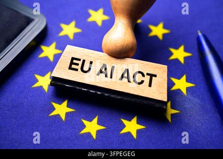 Stamp with the words "EU AI Act" on the EU flag, photomontage Stock Photo